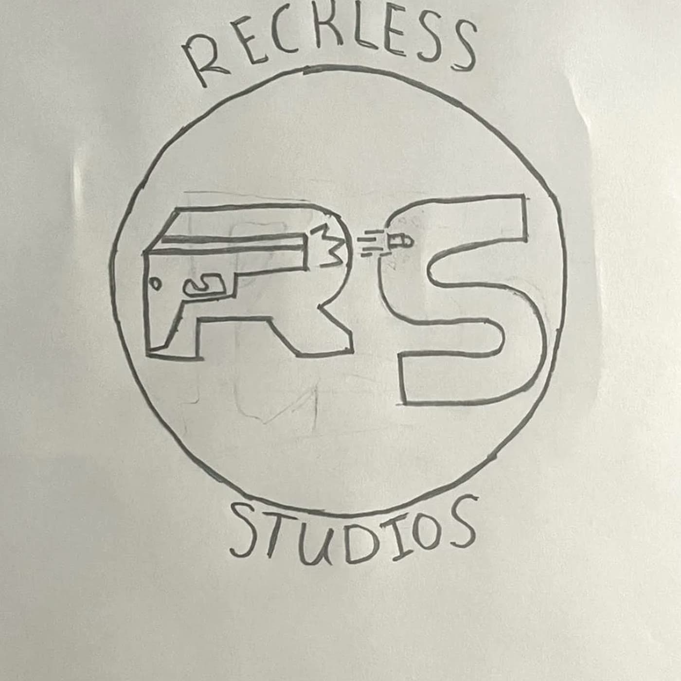 The original Reckless Studios logo, drawn in pencil on printer paper